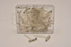 Box mit 50 transparenten Corsagenclips Kreuz