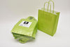 Tragetasche Lime kraft 18+8x22cm a 50 Stück gedrehter Griff