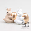 Osterhase aus Zement, 2-teilig, 10x6x9 cm, camel/weiß