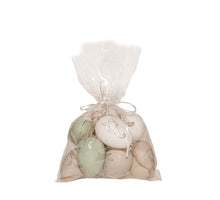 9 Ostereier mit Hasenmotiv im Beutel, Hase grün-weiß.