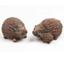 IGEL/KIND GOLD 2 SORTIERT 10X7X8 CM POLYRESIN